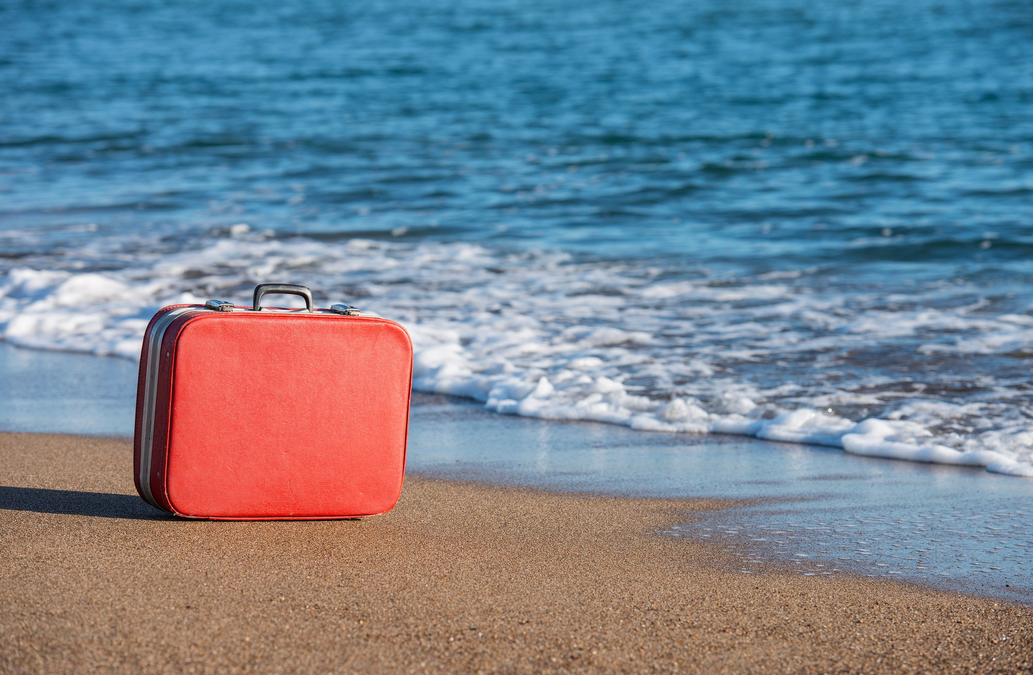 Suitcase on beach